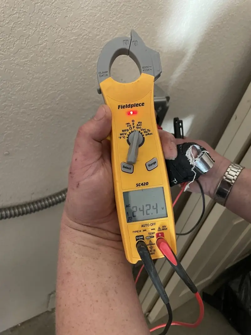 Voltage testing with clamp meter during Hot Tub / Pool Electrical Wiring in North Yarmouth